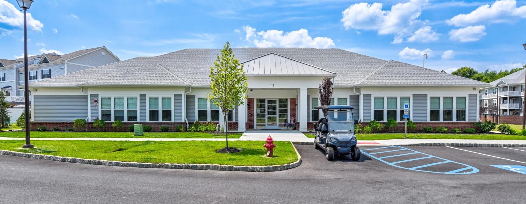leasing office exterior and parking lot