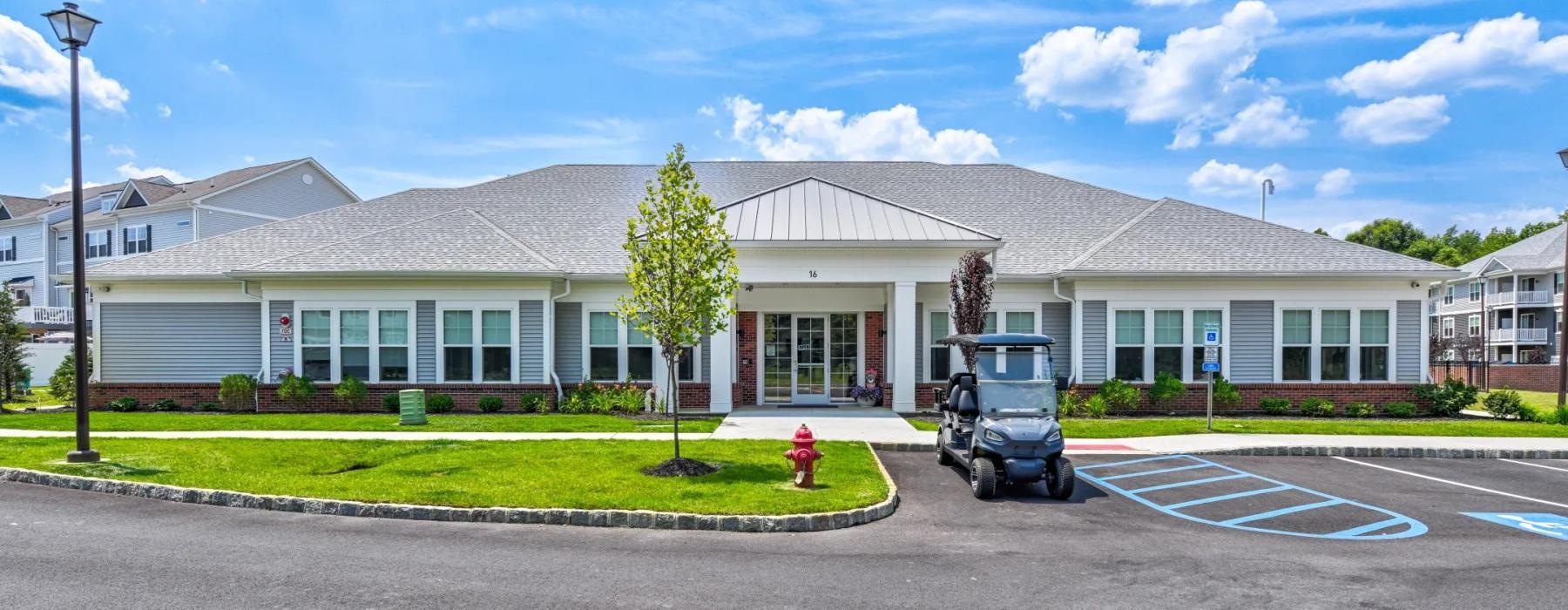 leasing office exterior and parking lot